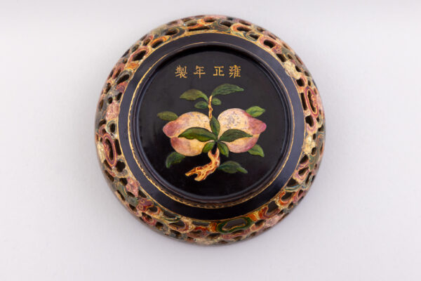 A rare reticulated painted lacquer box and cover (Yongzheng mark and period, 1723-1735)