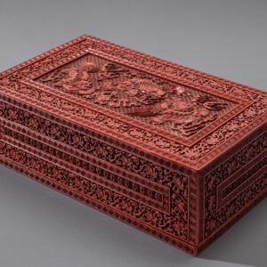 A rare imperial cinnabar lacquer ‘Buddhist lions’ treasure box and cover (Qianlong six-character and Suanni Baohe four-character marks and of the period)