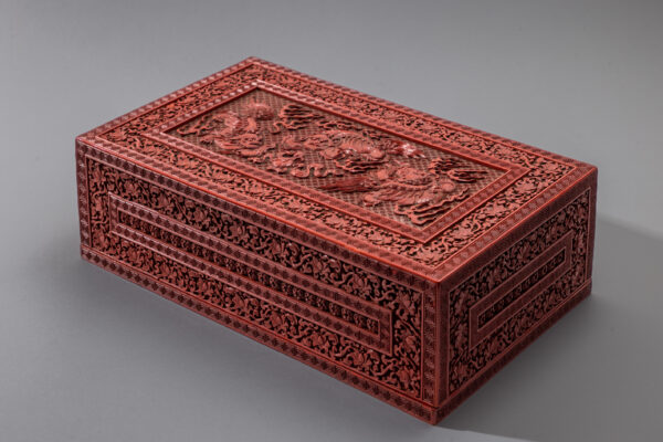 A rare imperial cinnabar lacquer ‘Buddhist lions’ treasure box and cover (Qianlong six-character and Suanni Baohe four-character marks and of the period)