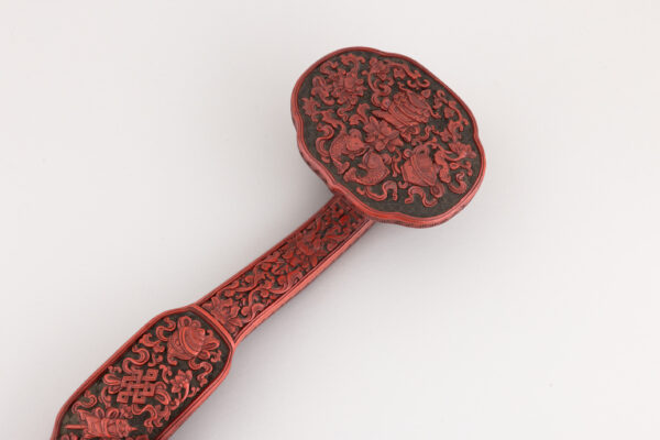 A cinnabar and black lacquer ‘ruyi’ sceptre (Qianlong period, 1735-1796)