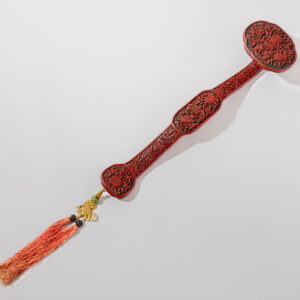 A cinnabar and black lacquer ‘ruyi’ sceptre (Qianlong period, 1735-1796)