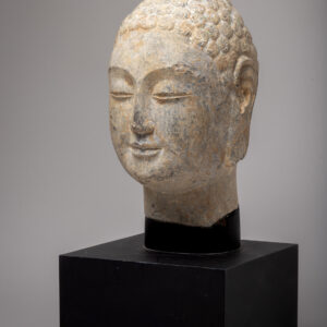 A finely carved limestone head of Buddha (Northern Qi dynasty, 550-577)